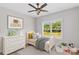 Cozy bedroom with a ceiling fan and large windows overlooking the greenery at Lot 101 Coppergate Dr, Salisbury, NC 28147