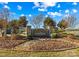 Stone-framed 'Yorkshire Farms' community entrance sign surrounded by manicured landscaping at Lot 101 Coppergate Dr, Salisbury, NC 28147