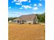 New construction home featuring a spacious yard and covered front porch at Lot 101 Coppergate Dr, Salisbury, NC 28147