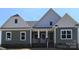Charming new construction home featuring a welcoming covered front porch at Lot 101 Coppergate Dr, Salisbury, NC 28147