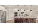 Modern kitchen with stainless steel appliances, white cabinets and a large center island at Lot 101 Coppergate Dr, Salisbury, NC 28147