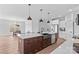 Bright kitchen with a large center island, modern appliances, and white cabinets at Lot 101 Coppergate Dr, Salisbury, NC 28147
