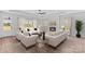 Bright living room featuring a cozy fireplace, comfortable seating, and ample natural light at Lot 101 Coppergate Dr, Salisbury, NC 28147