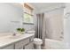 Well-lit bathroom with a neutral color scheme and a shower-tub combination at 100 Brookstone Dr, Mount Holly, NC 28120