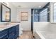 Stylish bathroom features double vanity, a glass shower and tub at 100 Brookstone Dr, Mount Holly, NC 28120