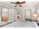 Spacious bedroom with views to the bathroom and kitchen, with light neutral decor at 100 Brookstone Dr, Mount Holly, NC 28120