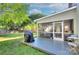 Spacious back deck leads to a screened porch and fenced yard at 10016 Tealridge Ln, Charlotte, NC 28277