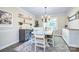 Elegant dining room with stylish furnishings, decorative shelving, and a cozy ambiance for entertaining at 10016 Tealridge Ln, Charlotte, NC 28277