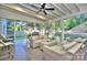 Comfortable screened porch with wicker furniture, ideal for relaxing at 10016 Tealridge Ln, Charlotte, NC 28277