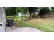 Backyard featuring a wood fence, storage shed, and patio, creating a relaxing outdoor space at 104 Gallarie Pl, Salisbury, NC 28144