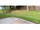 Spacious fenced backyard with a lush lawn and a concrete patio, perfect for outdoor enjoyment at 104 Gallarie Pl, Salisbury, NC 28144