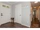 Bright entryway with hardwood floors, coat hooks, and ample natural light at 104 Gallarie Pl, Salisbury, NC 28144