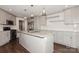 Updated kitchen with granite counters, stainless appliances and gray cabinets with an island at 104 Gallarie Pl, Salisbury, NC 28144