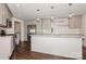 Modern kitchen features stainless steel appliances, granite countertops, and a large island at 104 Gallarie Pl, Salisbury, NC 28144