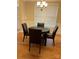 Cozy breakfast nook with round table and hardwood floors near the entry way at 10817 Bere Island Dr, Charlotte, NC 28278