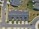 Overhead view of new construction townhomes with landscaping and backyard fences at 1108 Stella Ct, Monroe, NC 28110