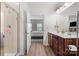 Bathroom featuring a glass-enclosed shower and double vanity at 1108 Stella Ct, Monroe, NC 28110