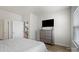 Inviting bedroom featuring natural light, a decorative dresser, and a serene ambiance at 1108 Stella Ct, Monroe, NC 28110