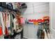 Walk-in closet with ample hanging space, shelves, and shoe storage at 1108 Stella Ct, Monroe, NC 28110