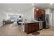 Open-concept area features a kitchen, dining area, and living room at 1108 Stella Ct, Monroe, NC 28110