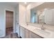 Modern bathroom featuring double sinks, a large mirror, and a separate shower at 126 Dorian Pl, Troutman, NC 28166