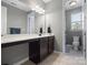 Bathroom featuring a vanity with dark cabinets and a separate toilet room at 1305 Kings Grove Dr, York, SC 29745