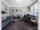 Comfortable home office with gray walls, hardwood floors, large desk, and ample light at 1305 Kings Grove Dr, York, SC 29745
