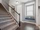 Carpeted staircase features white spindles and leads to the upper level of the home at 1305 Kings Grove Dr, York, SC 29745