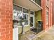 Charming front porch with plants and a 'Welcome' mat leading to a bright and inviting entrance at 1320 Fillmore Ave # 137, Charlotte, NC 28203