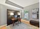 Well-lit office area with desk, lamps, and plenty of room to be productive at 1320 Fillmore Ave # 137, Charlotte, NC 28203