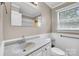 Cozy bathroom with a vanity, window, and a shower/tub at 1415 Midlake Rd, Kannapolis, NC 28083