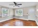 Bright living room featuring hardwood floors and natural light from the windows at 1415 Midlake Rd, Kannapolis, NC 28083