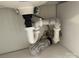 Plumbing under a sink, showcasing pipes, drains, and connections at 1415 Midlake Rd, Kannapolis, NC 28083
