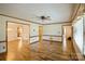 Spacious living room with hardwood floors, showcasing the home's open layout and natural light at 16612 Grapperhall Dr, Huntersville, NC 28078
