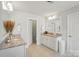 Bathroom vanity with granite countertop, double sinks, and ample storage at 16831 Alydar Commons Ln, Charlotte, NC 28278