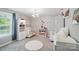 Charming room features twin beds, playful decor and a light grey carpet at 16831 Alydar Commons Ln, Charlotte, NC 28278