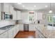 Kitchen featuring stainless steel appliances, granite countertops, and ample cabinet space at 16831 Alydar Commons Ln, Charlotte, NC 28278