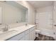 A well-lit bathroom features double sinks, a large mirror, and a shower-tub combo at 1711 Wooten Way, Bessemer City, NC 28016