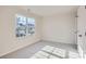 Cozy bedroom with soft carpet, a large window with a view, and a closet for storage at 1711 Wooten Way, Bessemer City, NC 28016