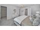 Spacious bedroom with a dresser, a view to the hallway, and a large comfy bed at 177 Briana Marie Way, Indian Trail, NC 28079