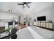 Open-concept living space with a modern kitchen, dining area, and comfortable seating, perfect for entertaining at 177 Briana Marie Way, Indian Trail, NC 28079