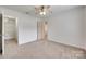 Bright bedroom with carpet flooring, ceiling fan and access to a closet or ensuite at 1866 Charter Dr, Rock Hill, SC 29732