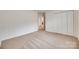 Spacious bedroom with carpet flooring, large closet, and natural light at 1866 Charter Dr, Rock Hill, SC 29732