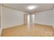 Cozy bedroom featuring wood flooring and neutral color palette at 1866 Charter Dr, Rock Hill, SC 29732