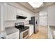 Well-lit kitchen with updated stainless steel appliances and light countertops at 1866 Charter Dr, Rock Hill, SC 29732