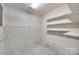 Unfinished storage room with shelves for storage at 1866 Charter Dr, Rock Hill, SC 29732