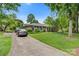 Well-maintained brick home with a long driveway and lush green lawn at 1940 12Th Ne St, Hickory, NC 28601