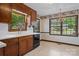 Charming eat-in kitchen boasts ample natural light and wood cabinets at 1940 12Th Ne St, Hickory, NC 28601