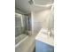 Modern bathroom featuring a double vanity, a glass-enclosed shower with a bench, and tile flooring at 2019 Tears Ln, Charlotte, NC 28217