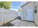 Fenced backyard featuring concrete patio and a storage shed for convenience at 2045 Flushing Ct, Charlotte, NC 28215
